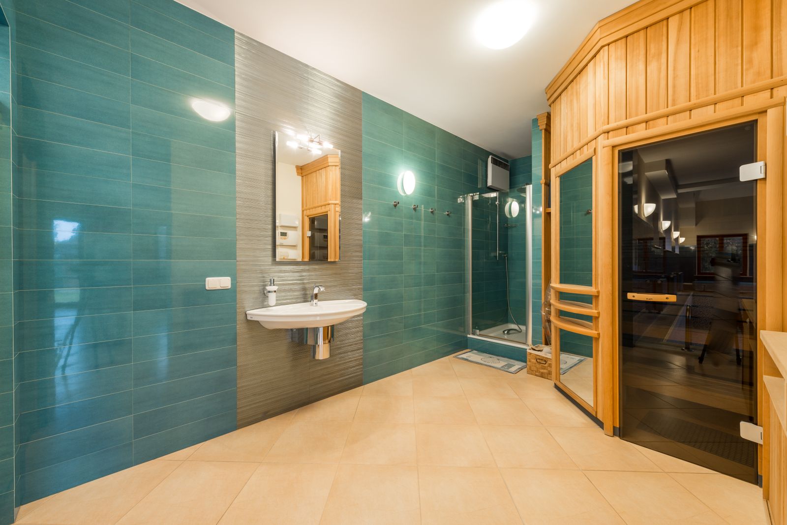 A home bathroom with a glass-front sauna